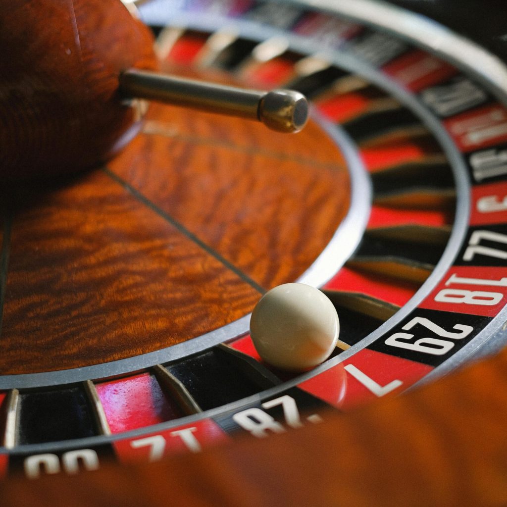 Detailed shot of a roulette wheel capturing the moment of suspense during a spin.